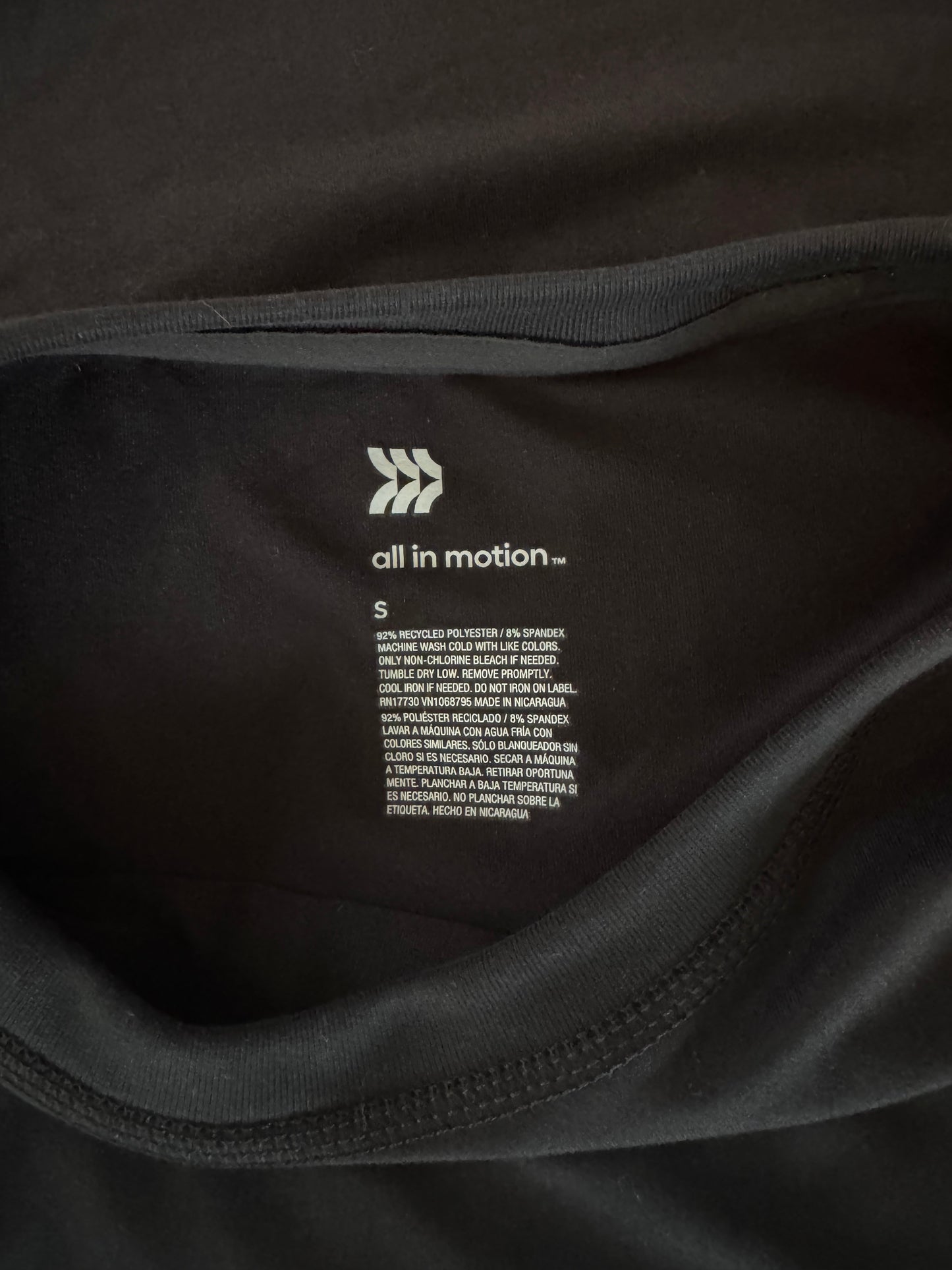 All In Motion Black Performance Top - Sweat-Wicking, Stretchy & Stylish for Ultimate Comfort